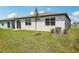 Spacious backyard and exterior view of the home at 31610 Malbec Dr, Brooksville, FL 34602
