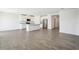 The kitchen features granite countertops, stainless-steel appliances, and flows into an open space at 31610 Malbec Dr, Brooksville, FL 34602