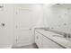 Bright bathroom featuring double sinks, granite countertop, and tiled shower at 3553 Moscato Dr, Brooksville, FL 34602