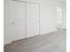 Bedroom featuring a closet with sliding doors at 3553 Moscato Dr, Brooksville, FL 34602