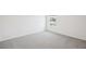 Neutral bedroom with carpet, and a sunlit window at 3553 Moscato Dr, Brooksville, FL 34602