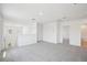 Upstairs bonus room with plush carpet, ample light, and easy access to rooms at 3553 Moscato Dr, Brooksville, FL 34602