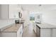 Well-lit kitchen with stainless steel appliances and granite countertops at 3553 Moscato Dr, Brooksville, FL 34602