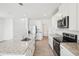 Modern kitchen with stainless appliances, granite countertops, and white cabinetry at 3553 Moscato Dr, Brooksville, FL 34602
