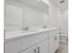 Elegant bathroom vanity with double sinks and a large mirror above at 3634 Moscato Dr, Brooksville, FL 34602
