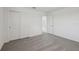 Bedroom featuring carpet, a closet, and entry to another room at 3634 Moscato Dr, Brooksville, FL 34602