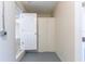 Basement entry with storage and view to room with ceiling fan at 777 27Th S Ave, St Petersburg, FL 33705
