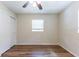 Bedroom featuring a ceiling fan, window, and closet at 777 27Th S Ave, St Petersburg, FL 33705
