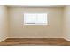 Bedroom featuring wood-look floors and a window at 777 27Th S Ave, St Petersburg, FL 33705