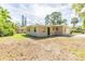 A charming single story home featuring a well maintained lawn and tropical foliage at 777 27Th S Ave, St Petersburg, FL 33705