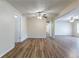 Open living room featuring wood-look floors and ceiling fans at 777 27Th S Ave, St Petersburg, FL 33705