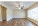 Bright living room with fan, new floors and large windows that let in lots of natural light at 777 27Th S Ave, St Petersburg, FL 33705