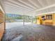 Spacious carport featuring an open design and convenient access to the outdoors at 8135 33Rd Ave N, St Petersburg, FL 33710