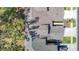An aerial view shows the rooftops and landscaping of the residences at 8539 Sandpiper Ridge Ave, Tampa, FL 33647