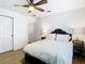Cozy bedroom featuring a plush bed, bright window, and en-suite bathroom, creating a comfortable atmosphere at 8539 Sandpiper Ridge Ave, Tampa, FL 33647