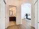 Hallway view showing bathroom and bedroom entrances, creating a cohesive flow at 8539 Sandpiper Ridge Ave, Tampa, FL 33647