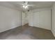 Bedroom with neutral carpet, ceiling fan, and closet at 4200 Cocoanut Ave, Sarasota, FL 34234