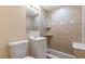 Updated bathroom featuring a tiled shower with a built-in bench and neutral colored walls at 10151 114Th N Ter, Largo, FL 33773