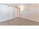 Spacious bedroom features a large closet, neutral carpet, and light-colored walls at 10151 114Th N Ter, Largo, FL 33773