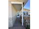 Covered front porch with decorative elements and a charming entrance at 1810 New Hampshire Ne Ave, St Petersburg, FL 33703