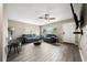 Bright living room with stylish tile floors, comfortable seating, and ample natural light at 1810 New Hampshire Ne Ave, St Petersburg, FL 33703