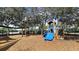 A lovely community playground with a small slide and beautiful mature shade trees at 1011 Signet, Apollo Beach, FL 33572