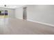 Spacious living room with tile floors and sliding glass doors to the backyard at 24299 Kingsway Cir, Punta Gorda, FL 33983