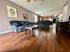 The living room features hardwood floors and a neutral color scheme, creating a stylish yet inviting atmosphere at 724 Parker Den Dr, Ruskin, FL 33570