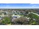 Panoramic aerial showcases a residential neighborhood with tree-lined streets and well-maintained homes at 11200 102Nd Ave # 74, Seminole, FL 33778