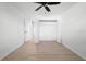 Bedroom with ceiling fan and open closet at 11200 102Nd Ave # 74, Seminole, FL 33778