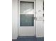 This inviting entrance features a storm door and mailbox at 11200 102Nd Ave # 74, Seminole, FL 33778