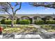 Charming townhome exterior featuring manicured landscaping and inviting curb appeal at 11200 102Nd Ave # 74, Seminole, FL 33778