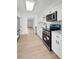 Kitchen featuring stainless steel appliances and minimalist hardware at 11200 102Nd Ave # 74, Seminole, FL 33778