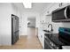 Stylish kitchen with stainless steel appliances, sleek cabinetry, and a functional layout at 11200 102Nd Ave # 74, Seminole, FL 33778