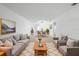 Inviting living room with contemporary furnishings, plush seating, and lots of space at 11200 102Nd Ave # 74, Seminole, FL 33778