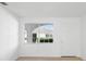 Bright living area featuring light wood flooring and crisp white walls at 11200 102Nd Ave # 74, Seminole, FL 33778