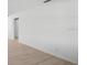 Bright and open living room with hardwood floors and fresh, neutral paint at 11200 102Nd Ave # 74, Seminole, FL 33778
