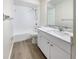 Clean bathroom with a shower-tub combo and modern vanity at 18284 Yale Ave, Port Charlotte, FL 33948
