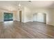 Bright, open living room featuring hard surface flooring and abundant natural light at 18284 Yale Ave, Port Charlotte, FL 33948