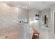 Stunning bathroom featuring a walk-in shower, soaking tub, and modern design at 24470 Kingsway Cir, Punta Gorda, FL 33983