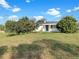 Charming single story home with a well maintained lawn and mature trees at 301 Francis Dr, Apollo Beach, FL 33572