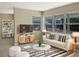 Bright living room with plenty of natural light and modern furnishings at 301 Francis Dr, Apollo Beach, FL 33572