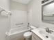 Bathroom featuring a shower-tub combo, toilet, and vanity with sink at 1110 Mcdaniel St # 1110, Sun City Center, FL 33573