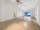 Spacious open-concept living room with vaulted ceilings and sliding glass doors for ample natural light at 1110 Mcdaniel St # 1110, Sun City Center, FL 33573