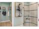 Gorgeous bathroom shower with glass door and designer tile at 3165 Alba Cir, Bradenton, FL 34211