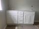 New bathroom vanity with double sinks, cabinet doors, and drawers offering storage space at 7268 Deer Valley Circle, Tampa, FL 33635