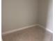 A freshly painted room with white trim and floor covering, offering a blank canvas for customization at 7268 Deer Valley Circle, Tampa, FL 33635