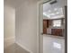 Bright kitchen featuring stainless steel appliances and granite countertops as seen through a doorway at 1631 S Lake Ave # 1, Clearwater, FL 33756