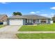 Charming single-Gathering home with a well-manicured lawn and two-car garage at 8918 Napa Loop, New Port Richey, FL 34653