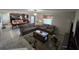 Open-concept living area with a view of the kitchen and dining area, great for entertaining and Gathering gatherings at 14825 Crescent Rock Dr, Wimauma, FL 33598